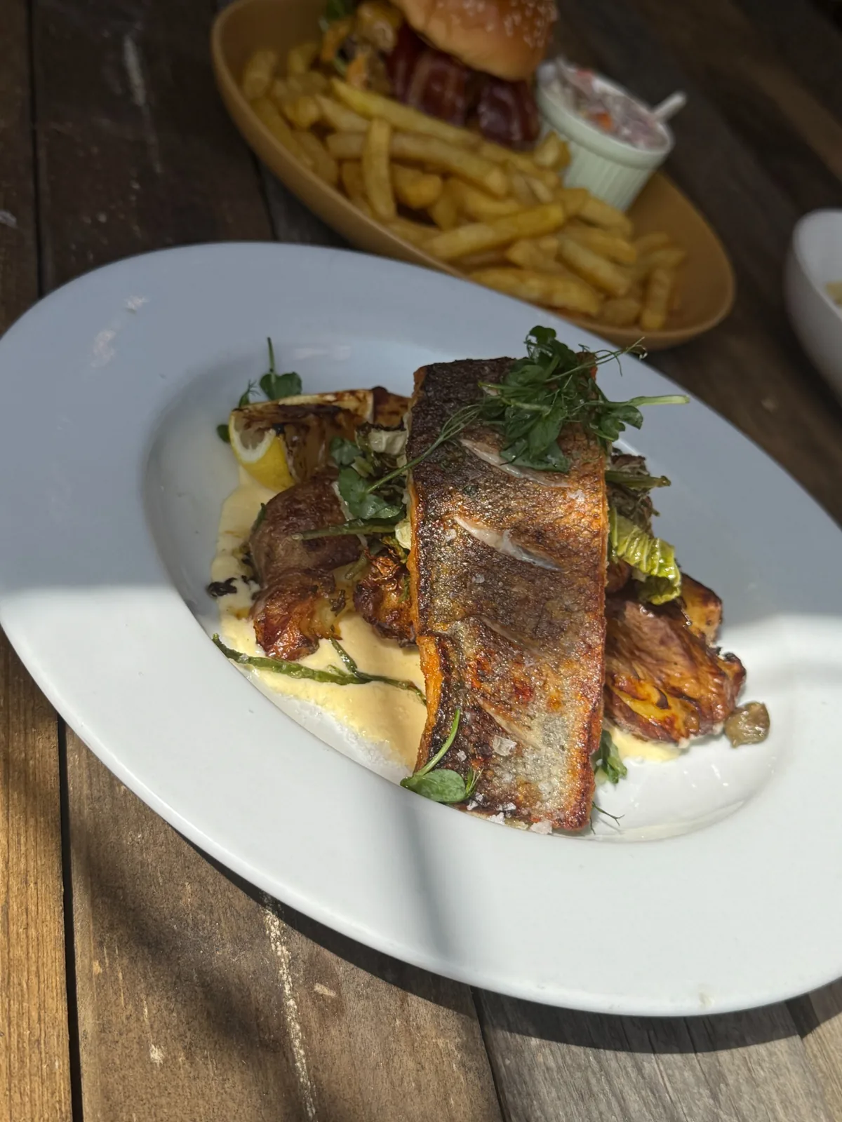 Pan-seared sea bass served at The Garden House